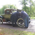 Checking things over at a rest stop.